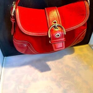 Vibrant Red Coach monogram hand bag
